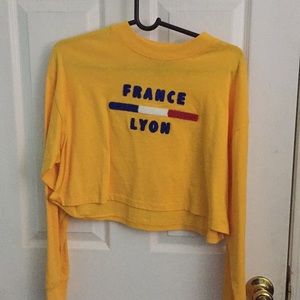 Yellow long sleeved shirt